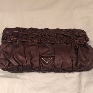 Prada clutch bag in purple